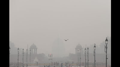 A thick layer of smog covers the Rashtrapati Bhavan in New Delhi on Saturday. (ANI) A thick layer of smog covers the Rashtrapati Bhavan in New Delhi on Saturday. (ANI)