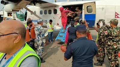 People airlifted from an earthquake-affected area arrive in Nepalgunj, Nepal. (AP) People airlifted from an earthquake-affected area arrive in Nepalgunj, Nepal. (AP)