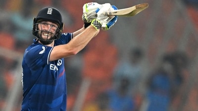 Chris Woakes watches the ball after playing a shot during the 2023 ICC Men's Cricket World Cup match between England and Australia (AFP) Chris Woakes watches the ball after playing a shot during the 2023 ICC Men's Cricket World Cup match between England and Australia (AFP)