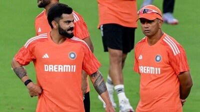 India's Virat Kohli (L) and coach Rahul Dravid interact during a practice session of a 2023 ICC Men's Cricket World Cup one-day international (ODI) match (AFP) India's Virat Kohli (L) and coach Rahul Dravid interact during a practice session of a 2023 ICC Men's Cricket World Cup one-day international (ODI) match (AFP)