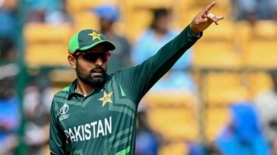 Pakistan's captain Babar Azam gestures during the 2023 ICC Men's Cricket World Cup one-day international (ODI) match between New Zealand and Pakistan (AFP)