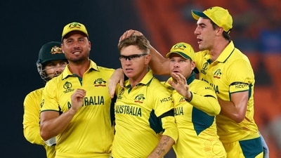 Adam Zampa celebrates with Pat Cummins, Steve Smith and Marcus Stoinis after taking the wicket of Jos Buttler (REUTERS)