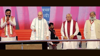 From left: Haryana BJP president Naib Saini, Union home minister Amit Shah, chief minister Manohar Lal Khattar and state home minister Anil Vij in Karnal on Thursday. (ANI) From left: Haryana BJP president Naib Saini, Union home minister Amit Shah, chief minister Manohar Lal Khattar and state home minister Anil Vij in Karnal on Thursday. (ANI)