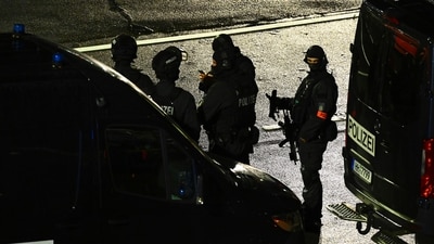 Police guard the scene of a security breach at the Hamburg Airport in Hamburg, Germany. (AP) Police guard the scene of a security breach at the Hamburg Airport in Hamburg, Germany. (AP)