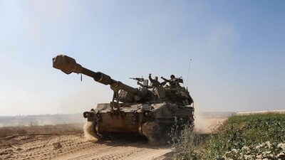 An Israeli army artillery howitzer moves near the border with the Gaza Strip in southern Israel on November 3. (AFP) An Israeli army artillery howitzer moves near the border with the Gaza Strip in southern Israel on November 3. (AFP)