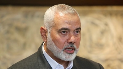 Palestinian group Hamas' top leader, Ismail Haniyeh, talks after meeting with Lebanese Parliament Speaker Nabih Berri in Beirut in 2021. (Reuters)