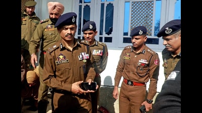 Jammu and Kashmir DGP RR Swain, along with senior police officials, visits the residence of a slain cop Ghulam Mohammad Dar, at Tangmarg in Baramulla district on Saturday. (ANI) Jammu and Kashmir DGP RR Swain, along with senior police officials, visits the residence of a slain cop Ghulam Mohammad Dar, at Tangmarg in Baramulla district on Saturday. (ANI)