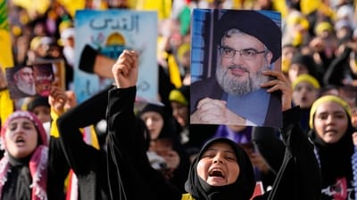 Supporters of the Iranian-backed Hezbollah group shout slogans, as they wait the speech of Hezbollah leader Sayyed Hassan Nasrallah, during a rally in Beirut, Lebanon, on November 3. (AP) Supporters of the Iranian-backed Hezbollah group shout slogans, as they wait the speech of Hezbollah leader Sayyed Hassan Nasrallah, during a rally in Beirut, Lebanon, on November 3. (AP)