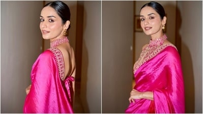 Manushi Chhillar, along with other celebrities, attended the Jio MAMI Mumbai Film Festival 2023 last night. Manushi walked the red carpet at the event dressed in an elegant silk saree in a stunning Rani pink shade, styled with a backless blouse. She also shared pictures of her look on Instagram. Scroll through to check it out and steal some styling tips from her to revamp your ethnic look. (Instagram) Manushi Chhillar, along with other celebrities, attended the Jio MAMI Mumbai Film Festival 2023 last night. Manushi walked the red carpet at the event dressed in an elegant silk saree in a stunning Rani pink shade, styled with a backless blouse. She also shared pictures of her look on Instagram. Scroll through to check it out and steal some styling tips from her to revamp your ethnic look. (Instagram)
