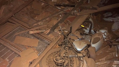 A motorcycle and broken windows are visible amidst the rubble in the aftermath of an earthquake in Jajarkot on Saturday. The epicenter of the quake was in Jajarkot district's Lamidanda, which is approximately 402 kilometres northeast of the Nepalese capital, Kathmandu. (AFP) A motorcycle and broken windows are visible amidst the rubble in the aftermath of an earthquake in Jajarkot on Saturday. The epicenter of the quake was in Jajarkot district's Lamidanda, which is approximately 402 kilometres northeast of the Nepalese capital, Kathmandu. (AFP)
