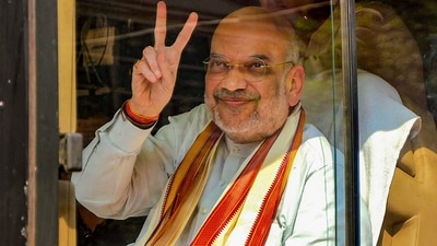 Union home minister Amit Shah shows a victory sign as he arrives to campaign for the upcoming assembly elections in Madhya Pradesh in Shivpuri district on November 4, (PTI) Union home minister Amit Shah shows a victory sign as he arrives to campaign for the upcoming assembly elections in Madhya Pradesh in Shivpuri district on November 4, (PTI)