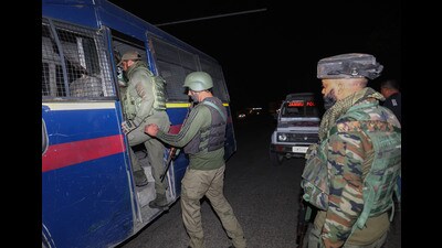 Security personnel deployed after an improvised explosive device (IED), placed inside a tiffin box, was found lying on the Sidhra-Narwal highway, in Jammu and Kashmir on Saturday. (PTI) Security personnel deployed after an improvised explosive device (IED), placed inside a tiffin box, was found lying on the Sidhra-Narwal highway, in Jammu and Kashmir on Saturday. (PTI)