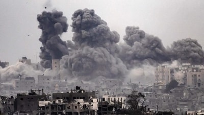 Smoke rising during Israeli bombardment of the Gaza Strip on October 29, 2023. (Fadel Senna/AFP) Smoke rising during Israeli bombardment of the Gaza Strip on October 29, 2023. (Fadel Senna/AFP)
