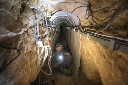 An Israeli army officer gives journalists a tour, Friday, July 25, 2014, of a tunnel allegedly used by Palestinian militants for cross-border attacks, at the Israel-Gaza Border. (AP) An Israeli army officer gives journalists a tour, Friday, July 25, 2014, of a tunnel allegedly used by Palestinian militants for cross-border attacks, at the Israel-Gaza Border. (AP)