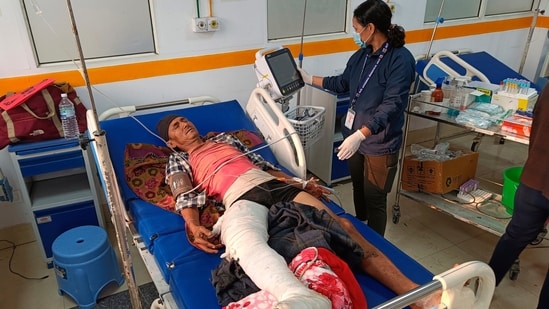 A doctor looks after an injured of an earthquake, evacuated from his village and brought to a hospital in Nepalgunj, Nepal.(AP)