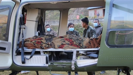 An injured person is seen inside a helicopter after an earthquake in Jajarkot, Nepal.(REUTERS)