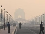 Commuters out on a smoggy morning amid rising air pollution on Kartavya Path in New Delhi Commuters out on a smoggy morning amid rising air pollution on Kartavya Path in New Delhi