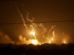 Flares burn in the sky as seen from the Israeli side of the border with Gaza, in southern Israel. (Reuters)