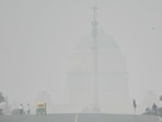 Commuters make their way near India's presidential palace Rashtrapati Bhavan amid heavy smoggy conditions in New Delhi on November 5, 2023. Authorities in the smog-ridden Indian capital New Delhi on November 5 extended an emergency schools closure by a week, with no signs of improvement in the megacity's choking levels of pollution. (Photo by Arun SANKAR / AFP) Commuters make their way near India's presidential palace Rashtrapati Bhavan amid heavy smoggy conditions in New Delhi on November 5, 2023. Authorities in the smog-ridden Indian capital New Delhi on November 5 extended an emergency schools closure by a week, with no signs of improvement in the megacity's choking levels of pollution. (Photo by Arun SANKAR / AFP)