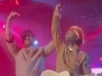Ranbir Kapoor and Arijit Singh give respect to each other at the singer's Chandigarh concert. Ranbir Kapoor and Arijit Singh give respect to each other at the singer's Chandigarh concert.