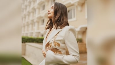 With the help of hairstylist Flavien Heldt, Alia styled her lush locks into soft curls and left them open at the centre, which perfectly complemented her elegant look. (Instagram/@priyankarkapadia) With the help of hairstylist Flavien Heldt, Alia styled her lush locks into soft curls and left them open at the centre, which perfectly complemented her elegant look. (Instagram/@priyankarkapadia)