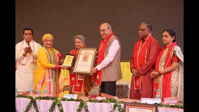 Nripendra Misra, the chairman of Ram Mandir Construction Committee, being conferred Swami Ram Kinkar award in Ayodhya. (Sourced)