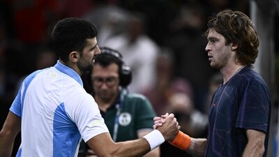 Winner Serbia's Novak Djokovic shakes hands with Andrey Rublev after their men's singles semi-final match on day six of the Paris ATP Masters 1000 tennis tournament (AFP) Winner Serbia's Novak Djokovic shakes hands with Andrey Rublev after their men's singles semi-final match on day six of the Paris ATP Masters 1000 tennis tournament (AFP)