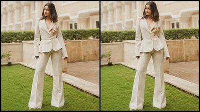 Her jacket features a gold floral sequin embellishment to the front, notched lapel collars, padded shoulders, full-length sleeves with slits at the cuffs, a deep V neckline, peplum style at the waist while the trousers have a high-rise waist, a relaxed silhouette and a flared hem. (Instagram/@priyankarkapadia) Her jacket features a gold floral sequin embellishment to the front, notched lapel collars, padded shoulders, full-length sleeves with slits at the cuffs, a deep V neckline, peplum style at the waist while the trousers have a high-rise waist, a relaxed silhouette and a flared hem. (Instagram/@priyankarkapadia)