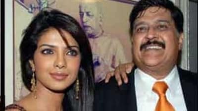 Priyanka Chopra with her father in an old picture. (File photo) 
</div)
