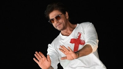 Shah Rukh Khan greets fans during his 58th birthday celebrations at his Mannat residence. (AFP) Shah Rukh Khan greets fans during his 58th birthday celebrations at his Mannat residence. (AFP)