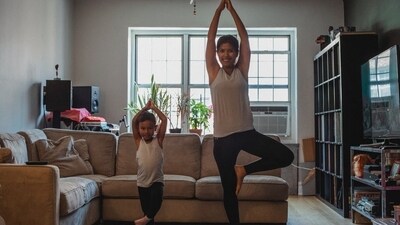 Vrikshasana: Stand straight and lift your right leg off the floor, placing your right foot on your left inner thigh. Balance on your left leg, using your palms for support if necessary. Join your palms in Pranam Mudra at your heart chakra and extend them upward. Repeat on both sides. (Pexels) Vrikshasana: Stand straight and lift your right leg off the floor, placing your right foot on your left inner thigh. Balance on your left leg, using your palms for support if necessary. Join your palms in Pranam Mudra at your heart chakra and extend them upward. Repeat on both sides. (Pexels)