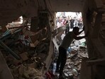 People inspect the rubble of a building in Rafah in the southern Gaza Strip on November 6, 2023, amid the ongoing battles between Israel and the Palestinian group Hamas. People inspect the rubble of a building in Rafah in the southern Gaza Strip on November 6, 2023, amid the ongoing battles between Israel and the Palestinian group Hamas.