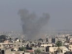 Israel-Hamas War: Smoke billows after a strike on Rafah in the southern Gaza Strip. Israel-Hamas War: Smoke billows after a strike on Rafah in the southern Gaza Strip.