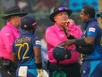 Charith Asalanka and Angelo Mathews talk to umpires after the latter is given 'timed out' during the ICC Cricket World Cup 2023 match between Sri Lanka and Bangladesh Charith Asalanka and Angelo Mathews talk to umpires after the latter is given 'timed out' during the ICC Cricket World Cup 2023 match between Sri Lanka and Bangladesh