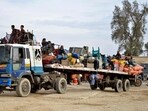 Afghan refugees with their belongings arrive on a truck from Pakistan, at a registration centre near the Afghanistan-Pakistan border in the Spin Boldak district of Kandahar province on Monday. Afghan refugees with their belongings arrive on a truck from Pakistan, at a registration centre near the Afghanistan-Pakistan border in the Spin Boldak district of Kandahar province on Monday.