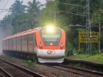 Vande Bharat Express passing through a station in Kerala. Vande Bharat Express passing through a station in Kerala.