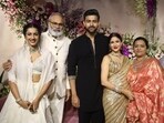 Varun Tej and Lavanya Tripathi pose with his family at the reception. 