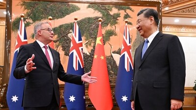 Australia's Prime Minister Anthony Albanese, left, gestures as he meets with China's President Xi Jinping at the Great Hall of the People in Beijing, China. (AP)