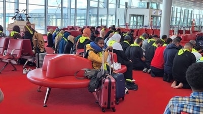 People seen praying at Charles de Gaulle airport in Paris, France. People seen praying at Charles de Gaulle airport in Paris, France.