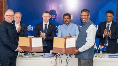 Prof Iain Martin, Vice Chancellor, Deakin University, and Prof Rajat Moona, Director, IITGN exchanging MoUs. (Handout) Prof Iain Martin, Vice Chancellor, Deakin University, and Prof Rajat Moona, Director, IITGN exchanging MoUs. (Handout)
