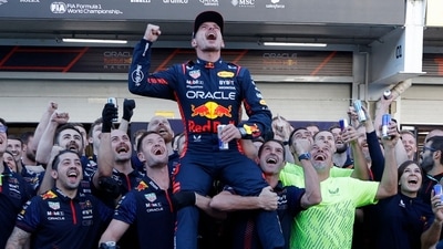 Red Bull's Max Verstappen celebrates after winning the Brazilian Grand Prix with teammates (REUTERS)