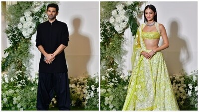 Ananya Panday and Aditya Roy Kapur made a grand entrance at the party in their exquisite traditional outfits. Aditya showcased a debonair style with his short black bandhgala kurta, paired with Pathani pants and accentuated by statement jewelry. Ananya gracefully matched his style with a lemon-green lehenga set adorned with silver floral embroidery. (HT Photo) Ananya Panday and Aditya Roy Kapur made a grand entrance at the party in their exquisite traditional outfits. Aditya showcased a debonair style with his short black bandhgala kurta, paired with Pathani pants and accentuated by statement jewelry. Ananya gracefully matched his style with a lemon-green lehenga set adorned with silver floral embroidery. (HT Photo)