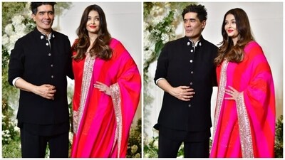 Aishwarya Rai chose a vibrant combination of crimson and pink for her outfit at Manish Malhotra's Diwali party, wearing a kurta and palazzo ensemble. (HT Photo) Aishwarya Rai chose a vibrant combination of crimson and pink for her outfit at Manish Malhotra's Diwali party, wearing a kurta and palazzo ensemble. (HT Photo)