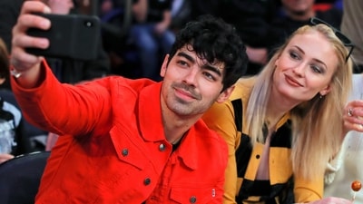 Joe Jonas takes a selfie with Sophie Turner during a break in play of an NBA basketball game in 2019. (File Photo/ AP) Joe Jonas takes a selfie with Sophie Turner during a break in play of an NBA basketball game in 2019. (File Photo/ AP)