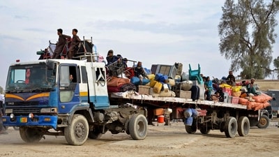 Afghan refugees with their belongings arrive on a truck from Pakistan, at a registration centre near the Afghanistan-Pakistan border in the Spin Boldak district of Kandahar province on Monday. (AFP) Afghan refugees with their belongings arrive on a truck from Pakistan, at a registration centre near the Afghanistan-Pakistan border in the Spin Boldak district of Kandahar province on Monday. (AFP)