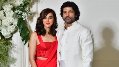 Farhan Akhtar and wife Shibani Dandekar were also at Manish Malhotra's Diwali bash. While Farhan was in a white sherwani, Shibani looked pretty in a red corset and saree. Farhan Akhtar and wife Shibani Dandekar were also at Manish Malhotra's Diwali bash. While Farhan was in a white sherwani, Shibani looked pretty in a red corset and saree. 