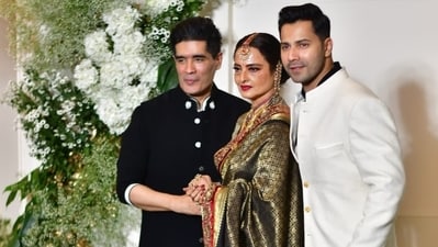 Veteran actor Rekha was the star of the night. Host Manish Malhotra came to receive her and Varun Dhawan also posed with her at the venue. She looked beautiful in an olive green saree paired with gold jewellery. Veteran actor Rekha was the star of the night. Host Manish Malhotra came to receive her and Varun Dhawan also posed with her at the venue. She looked beautiful in an olive green saree paired with gold jewellery. 