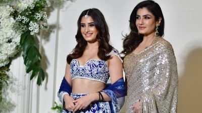 Raveena Tandon was also spotted in a silver paired with a golden blouse. She was accompanied by daughter Rasha Thadani who was in a blue and white lehenga. Raveena Tandon was also spotted in a silver paired with a golden blouse. She was accompanied by daughter Rasha Thadani who was in a blue and white lehenga. 