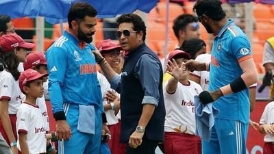 Virat Kohli and Sachin Tendulkar having a conversation. (REUTERS)