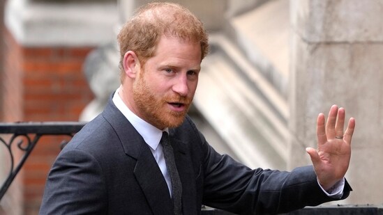 FILE - Britain's Prince Harry salutes media as he arrives at the Royal Courts of Justice in London, on March 30, 2023. Prince Harry is attending a charity event in London, though he isn’t expected to meet with King Charles III or Prince William as Britain prepares to mark the first anniversary of Queen Elizabeth II’s death. Harry’s relationship with his family has been strained since he and his wife, Meghan, moved to California in 2020. (AP Photo/Kirsty Wigglesworth, File) (AP)